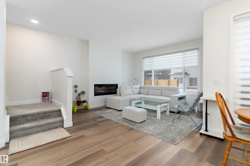 3543 Erlanger Link, Edmonton, AB - Indoor Photo Showing Living Room With Fireplace