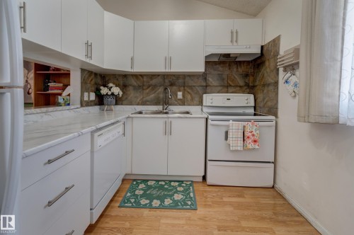 5626 19A Avenue, Edmonton, AB - Indoor Photo Showing Kitchen With Double Sink