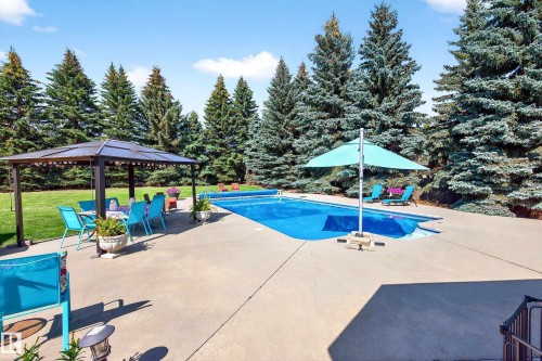 24 Valleyview Crescent, Rural Sturgeon County, AB - Outdoor With In Ground Pool With Backyard
