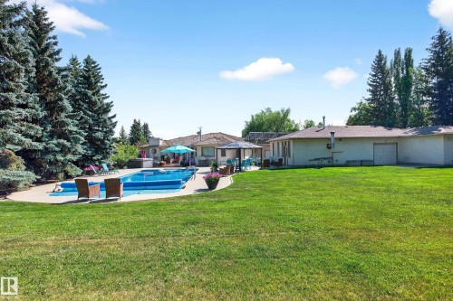 24 Valleyview Crescent, Rural Sturgeon County, AB - Outdoor With In Ground Pool With Backyard