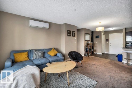 214 12045 22 Avenue, Edmonton, AB - Indoor Photo Showing Living Room