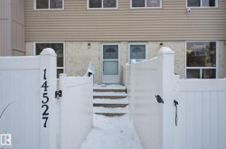 Property entrance featuring a gate - 