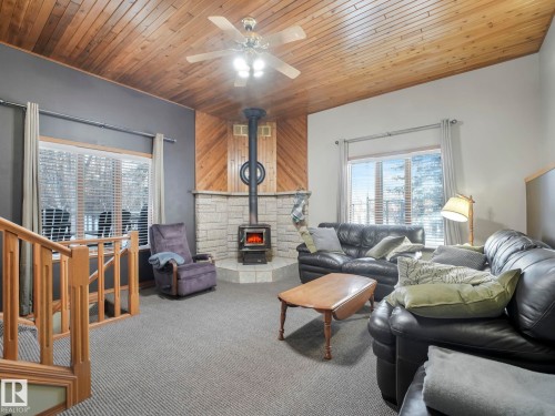 73 23020 Twp Road 522, Rural Strathcona County, AB - Indoor Photo Showing Living Room With Fireplace