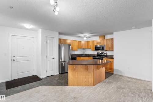 226 300 Spruce Ridge Road, Spruce Grove, AB - Indoor Photo Showing Kitchen With Stainless Steel Kitchen