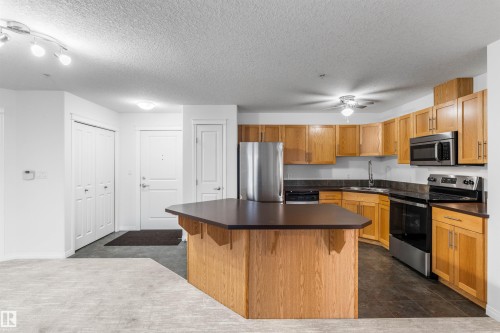 226 300 Spruce Ridge Road, Spruce Grove, AB - Indoor Photo Showing Kitchen With Stainless Steel Kitchen With Double Sink