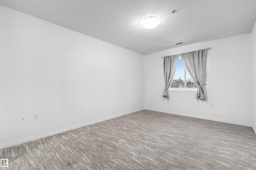 226 300 Spruce Ridge Road, Spruce Grove, AB - Indoor Photo Showing Other Room