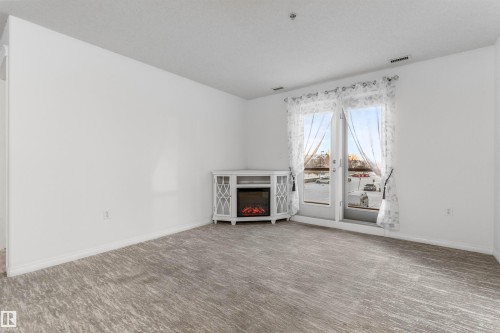 226 300 Spruce Ridge Road, Spruce Grove, AB - Indoor With Fireplace