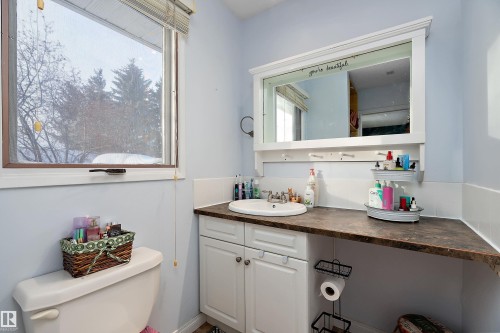 Bathroom featuring vanity and toilet - 145 Plum Crescent, Wetaskiwin, AB - Indoor Photo Showing Bathroom