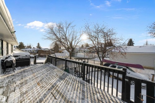 Wooden terrace featuring a residential view - 145 Plum Crescent, Wetaskiwin, AB - Outdoor With Exterior