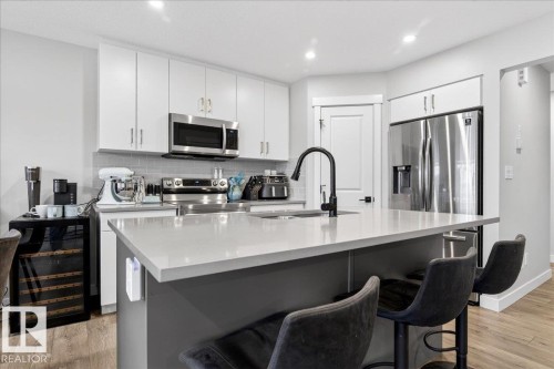 592 Meadowview Drive, Fort Saskatchewan, AB - Indoor Photo Showing Kitchen With Double Sink With Upgraded Kitchen