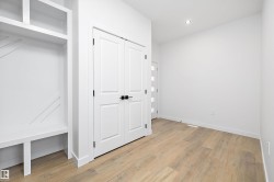 Unfurnished bedroom with light wood-type flooring, a closet, and recessed lighting - 