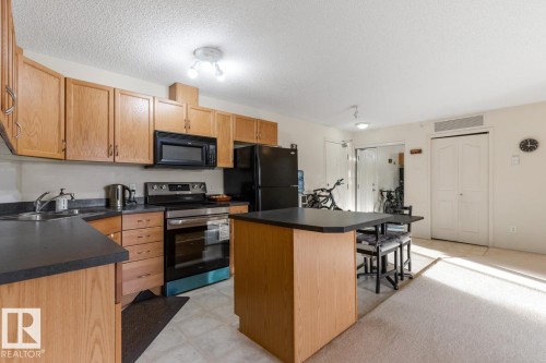 430 16311 95 Street, Edmonton, AB - Indoor Photo Showing Kitchen With Double Sink