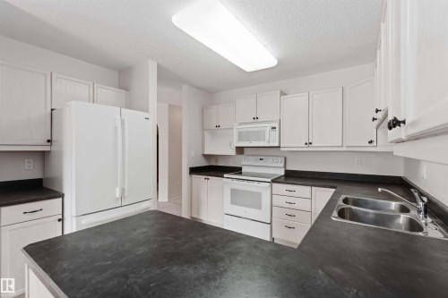 312 15499 Castle Downs Road, Edmonton, AB - Indoor Photo Showing Kitchen With Double Sink