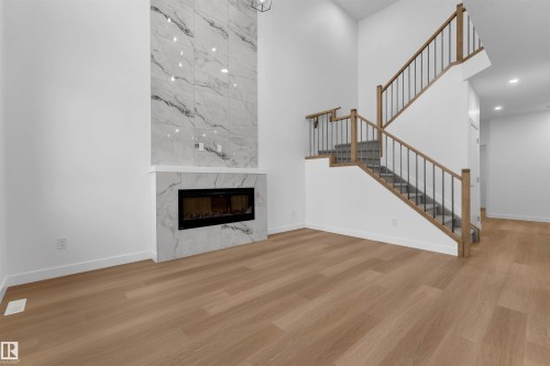 28 Norwyck Way, Spruce Grove, AB - Indoor Photo Showing Living Room With Fireplace