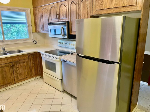 6411 149 Avenue, Edmonton, AB - Indoor Photo Showing Kitchen With Double Sink