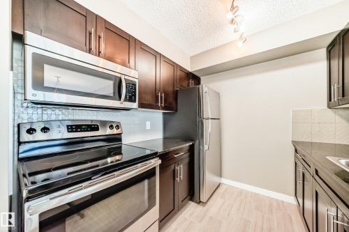 226 1510 Watt Drive, Edmonton, AB - Indoor Photo Showing Kitchen With Stainless Steel Kitchen