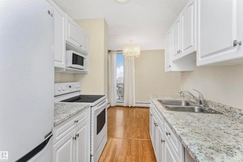 1711 10883 Saskatchewan Drive, Edmonton, AB - Indoor Photo Showing Kitchen With Double Sink