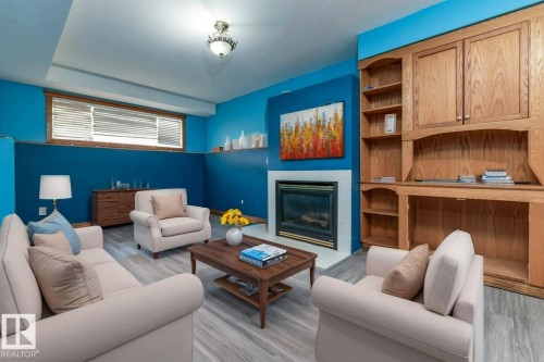 148 William Bell Drive, Leduc, AB - Indoor Photo Showing Living Room With Fireplace