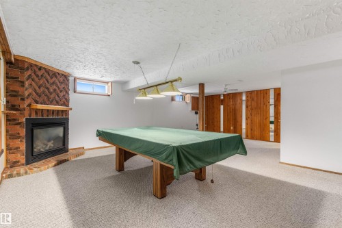 101 Brookwood Drive, Spruce Grove, AB - Indoor Photo Showing Other Room With Fireplace