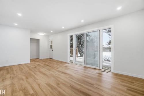 Spare room with light wood-type flooring and recessed lighting - 5711 95 Avenue, Edmonton, AB - Indoor Photo Showing Other Room