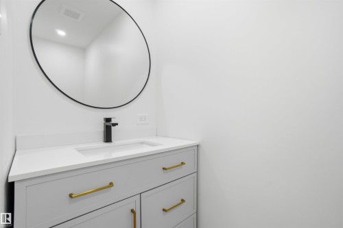 Bathroom featuring vanity - 5711 95 Avenue, Edmonton, AB - Indoor Photo Showing Bathroom