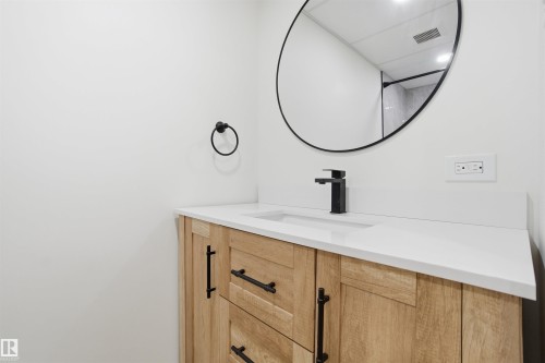 Bathroom with vanity - 5711 95 Avenue, Edmonton, AB - Indoor Photo Showing Bathroom