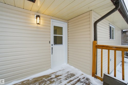 Doorway to property with a deck - 5711 95 Avenue, Edmonton, AB - Outdoor With Exterior