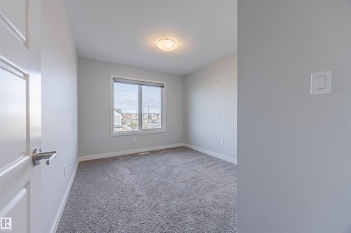 1745 Plum Crescent Sw, Edmonton, AB - Indoor Photo Showing Other Room