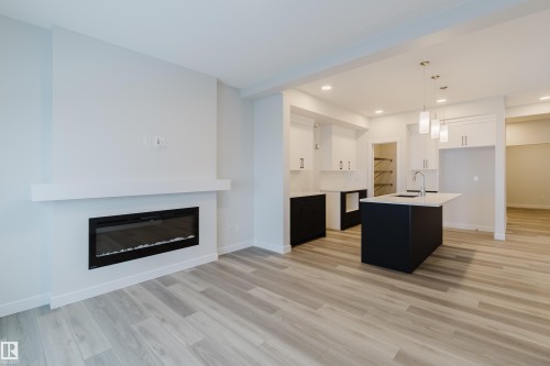 4118 67 Street, Beaumont, AB - Indoor Photo Showing Living Room With Fireplace