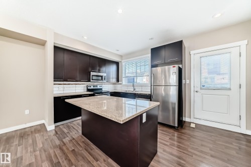 65 8315 180 Avenue, Edmonton, AB - Indoor Photo Showing Kitchen With Stainless Steel Kitchen With Upgraded Kitchen