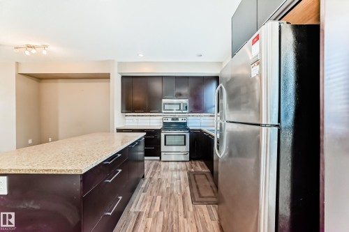 65 8315 180 Avenue, Edmonton, AB - Indoor Photo Showing Kitchen With Stainless Steel Kitchen