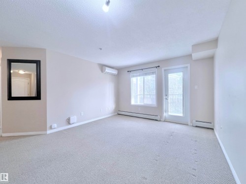 206 111 Edwards Drive, Edmonton, AB - Indoor Photo Showing Other Room