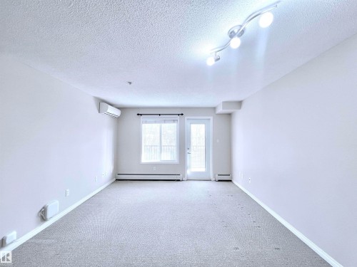 206 111 Edwards Drive, Edmonton, AB - Indoor Photo Showing Other Room