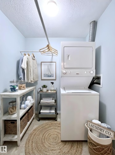 206 111 Edwards Drive, Edmonton, AB - Indoor Photo Showing Laundry Room