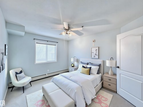 206 111 Edwards Drive, Edmonton, AB - Indoor Photo Showing Bedroom