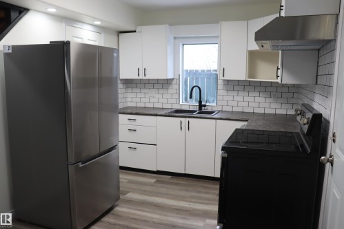 All new appliances - 4508 52 St., Wetaskiwin, AB - Indoor Photo Showing Kitchen With Double Sink