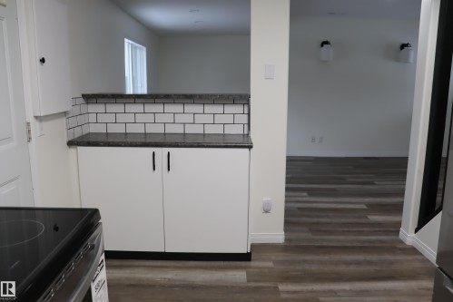 Extra counter space plus raised eating Bar of 3 stools - 4508 52 St., Wetaskiwin, AB - Indoor