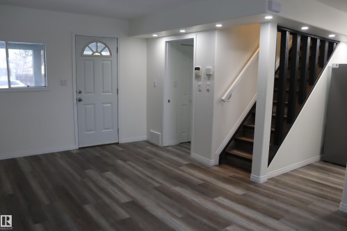 New pot lighting and new flooring - 4508 52 St., Wetaskiwin, AB - Indoor Photo Showing Other Room