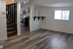 Living room with dinette, all new flooring and lighting - 