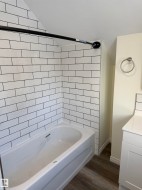 Main Bath upstairs new ceramic tile and all new fixtures, and faucets - 