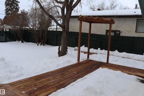 Brand new treat wood sidewalks and terciles for the spring gardening season to plant those vines. Plus raised flower bed. - 4508 52 St., Wetaskiwin, AB - Outdoor