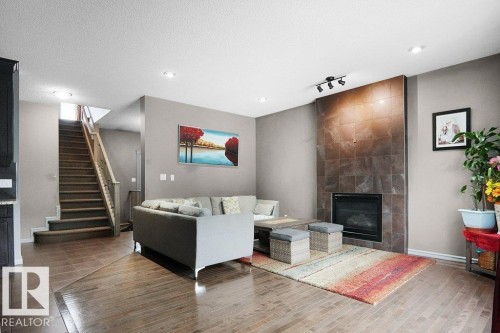 1533 36B Avenue, Edmonton, AB - Indoor Photo Showing Living Room With Fireplace