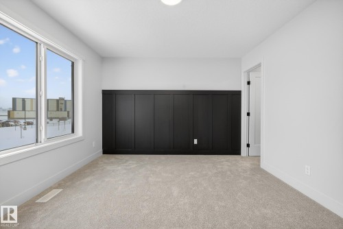 Unfurnished bedroom with light carpet - 119 Brickyard Drive, Stony Plain, AB - Indoor Photo Showing Other Room