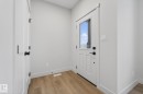 Entryway featuring wood finished floors and baseboards - 119 Brickyard Drive, Stony Plain, AB  - Indoor Photo Showing Other Room 
