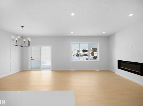15180 28 Street, Edmonton, AB - Indoor Photo Showing Living Room With Fireplace