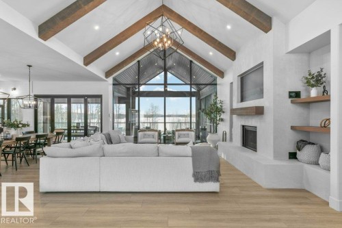 42 2307 Twp Road 522, Rural Parkland County, AB - Indoor Photo Showing Living Room With Fireplace