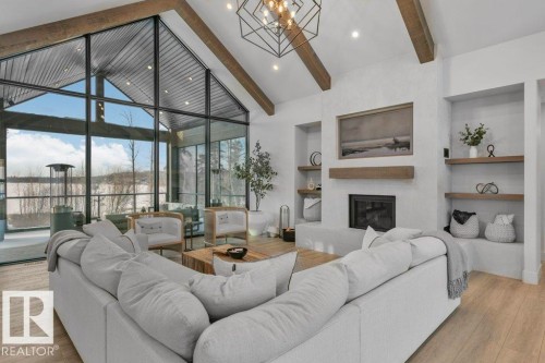 42 2307 Twp Road 522, Rural Parkland County, AB - Indoor Photo Showing Living Room With Fireplace