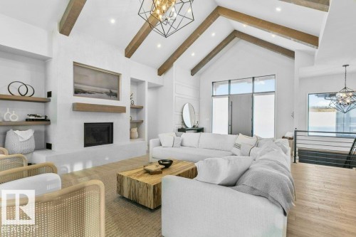 42 2307 Twp Road 522, Rural Parkland County, AB - Indoor Photo Showing Living Room With Fireplace