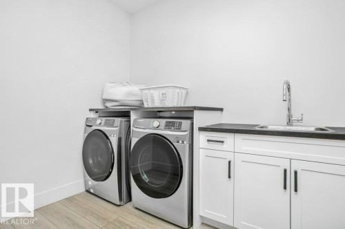 42 2307 Twp Road 522, Rural Parkland County, AB - Indoor Photo Showing Laundry Room