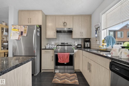 11 3025 151 Avenue, Edmonton, AB - Indoor Photo Showing Kitchen With Stainless Steel Kitchen With Upgraded Kitchen
